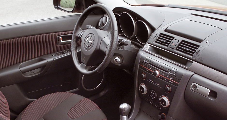 Mazda 3 5D (I/BK) 1.4 (84) - Фото 3